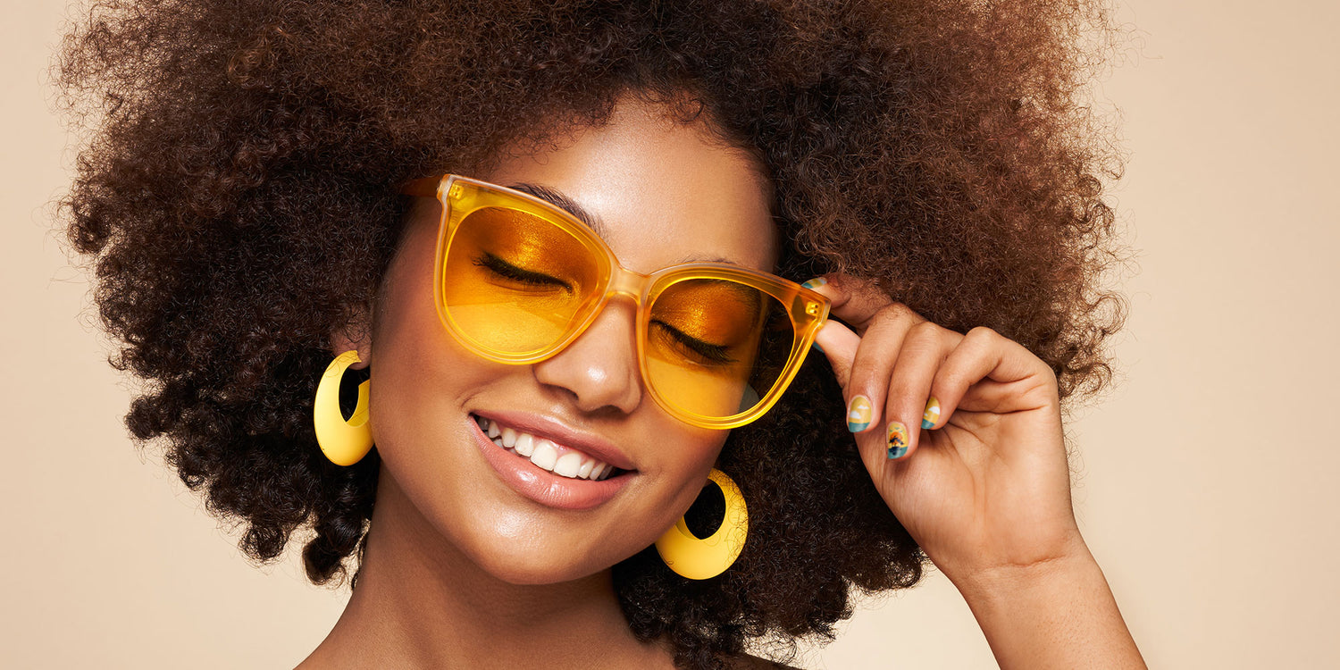 Black woman with sunglasses and MoYou London Vacay collection stamping nail art manicure